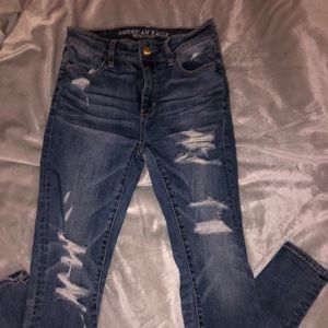 Dark washed ripped jeans